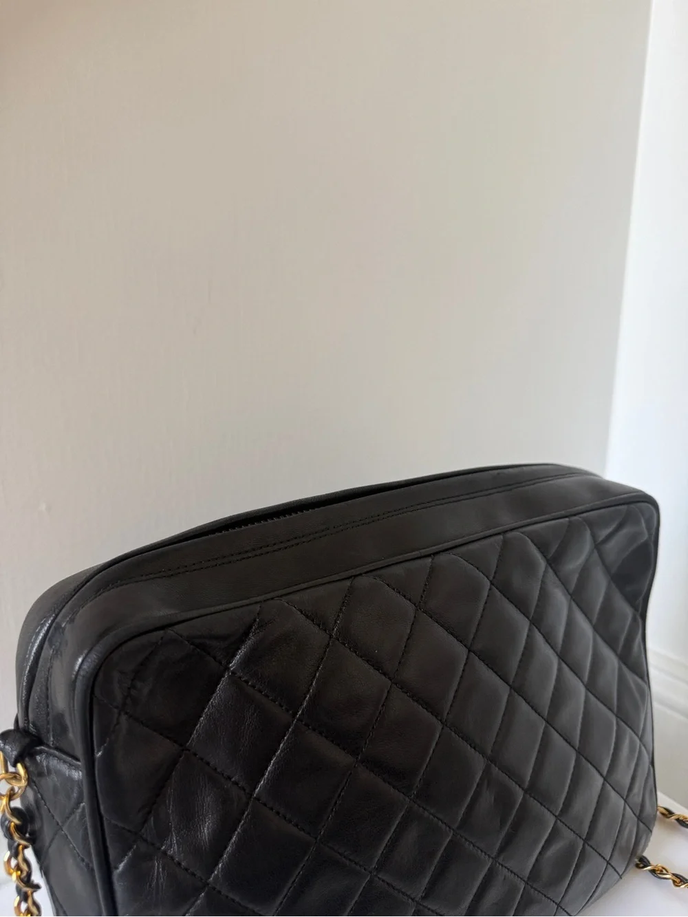 CHANEL Black Quilted Lambskin Crossbody with Gold Chain & Tassel